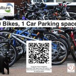A huge pile of bicycles, with black cat in the foreground, with title, logos & QR code