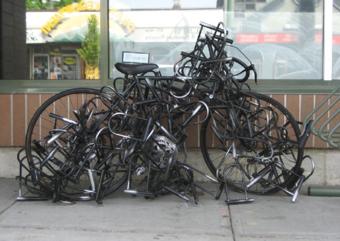 Bicycle padlocked with perhaps 100 bike locks